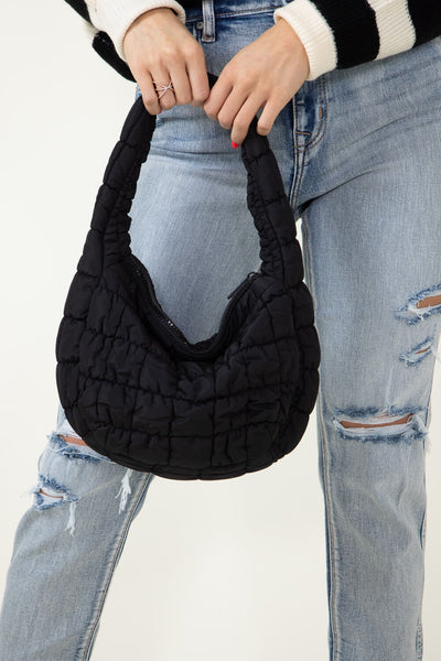 https://cdn.shopify.com/s/files/1/0082/2729/1236/files/small-quilted-puffer-bag-black-women-QBS320124-BLACK-3_400x.jpg?v=1700244961