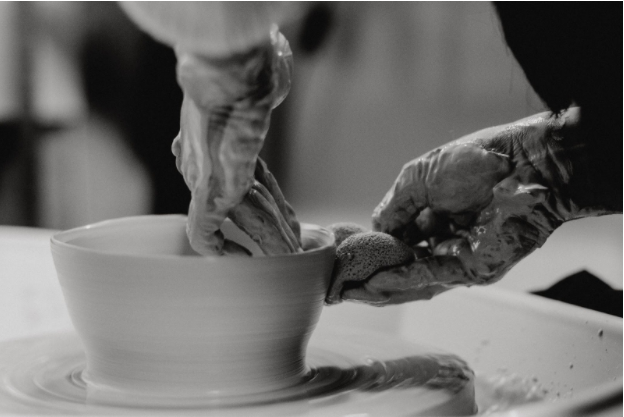 Nikki, Owner of tapoutapu, in action at a pottery class, creating a bowl.