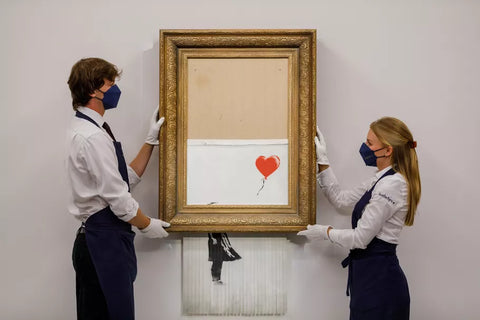 7 Times Banksy Has Done Something For Charity - Girl with balloon | Andy okay - Art for Good Causes