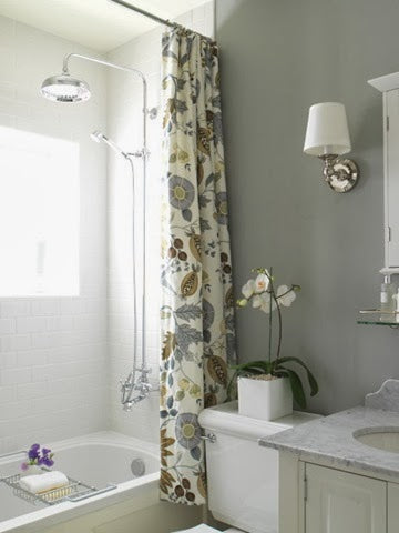 contemporary gray bathroom with an extra long shower curtain hung close to the ceiling, making the bathroom look HUGE!... Beautiful Bathroom Inspiration: Contemporary Shower Curtain Ideas from Bathroom Bliss by Rotator Rod