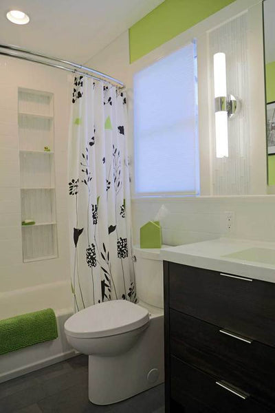 contemporary lime green, black, and white bathroom with curved shower rod... Straight Vs. Curved Shower Rods from Bathroom Bliss by Rotator Rod