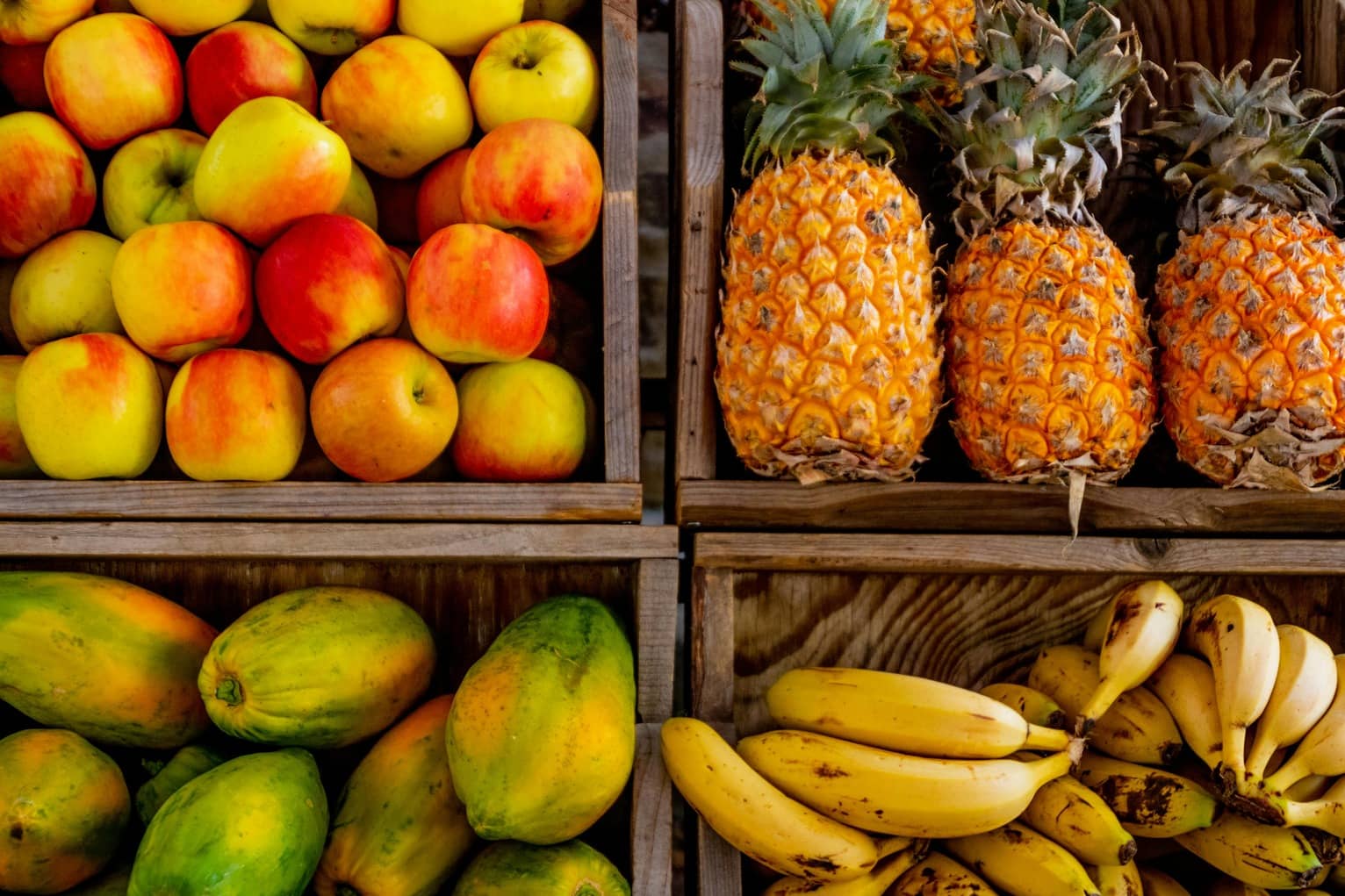 A variety of fruits stored in boxes