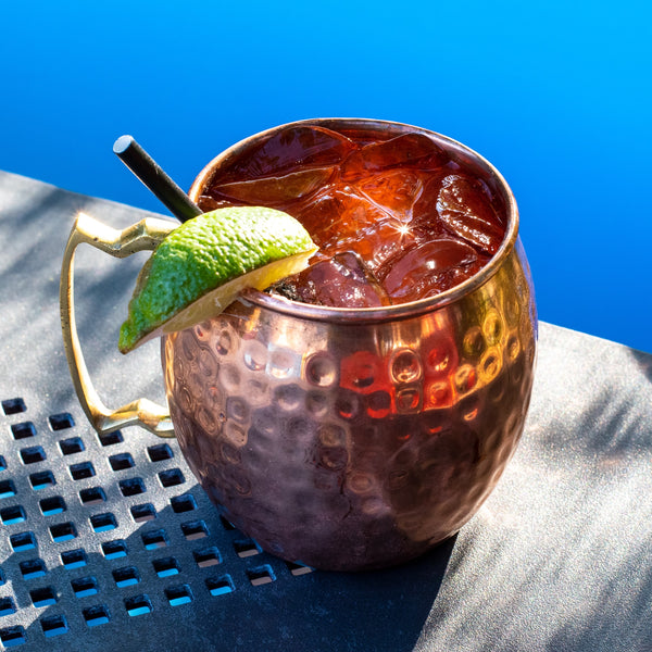  An orange ginger Moscow mule by the pool