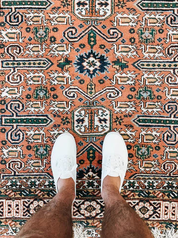 Don't allow visitors to wear shoes when cleaning a rug 