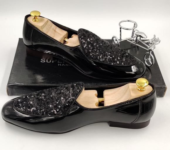 black loafers designer