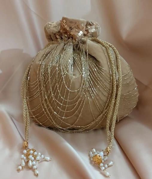 Packaging Bags Golden Potli Bag Embroidery Wedding Gifting potli Bag at Rs  75/piece in Jaipur