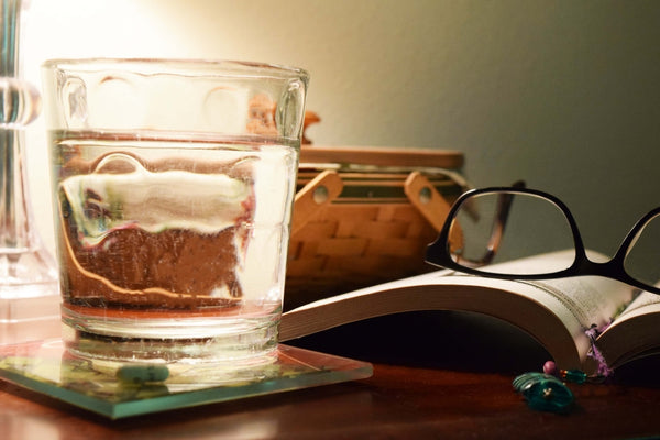 A glass of water by the bedside