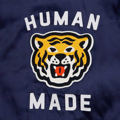 human made logo on college jacket
