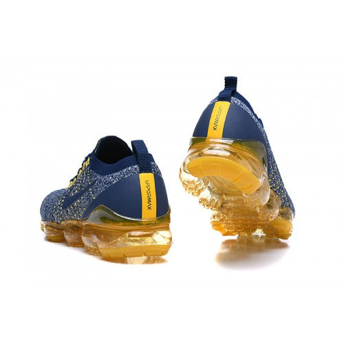 blue and yellow vapormax