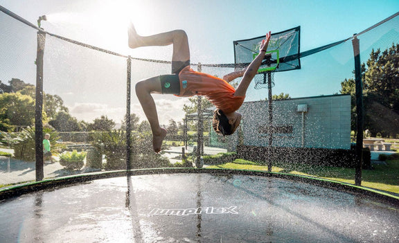 backflip on trampoline with water