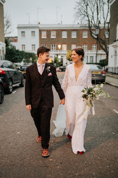 Sunset over a London bridal couple