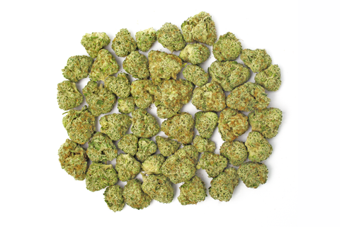 28 grams of cannabis nugs on a white background