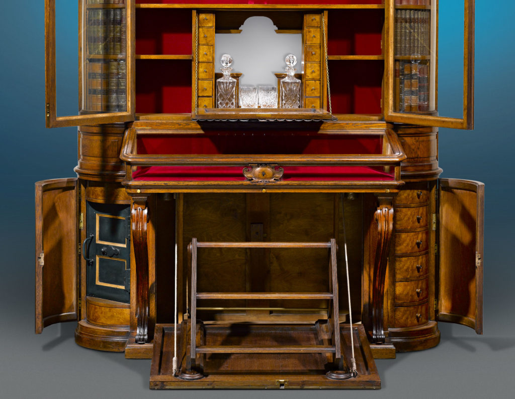 Victorian Era Secret Bookcase with its hidden compartments revealed
