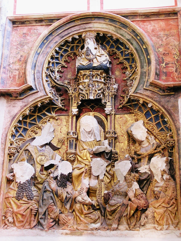 Altarpiece in St. Martin's Cathedral. The figures' heads were removed as a result of Reformation iconoclasm in the 16th century.