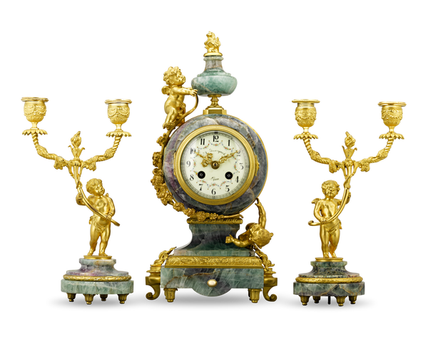 French Fluorspar and Ormolu Clock Garniture. 19th Century. M.S. Rau, New Orleans.