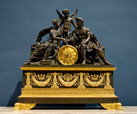 French Empire mantel clock. Circa 1810. The Louvre Museum, Paris.