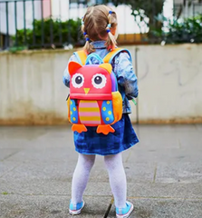 toddler wearing backpack