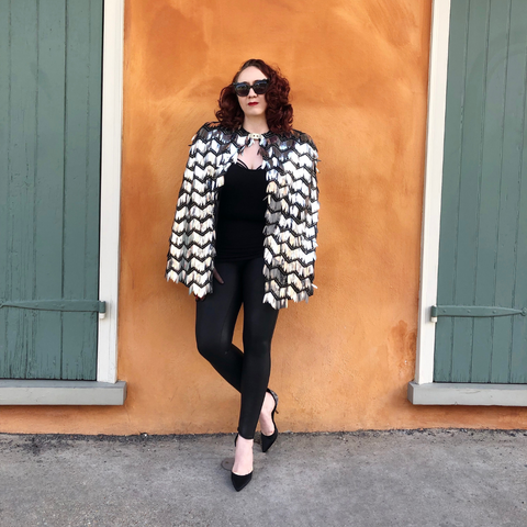 Designer Leslie Courreges wears an Eleanor Cape in New Orleans' historic French Quarter.