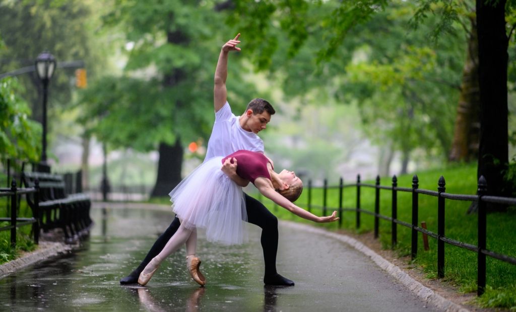 Two BLOCH Young Artists ballet dancing through Central Park, shot by Jordan Matter