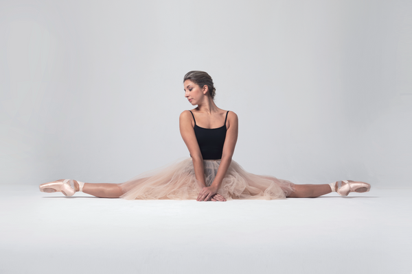 Ballerina Sat in Middle Splits in Tutu and Pointe Shoes