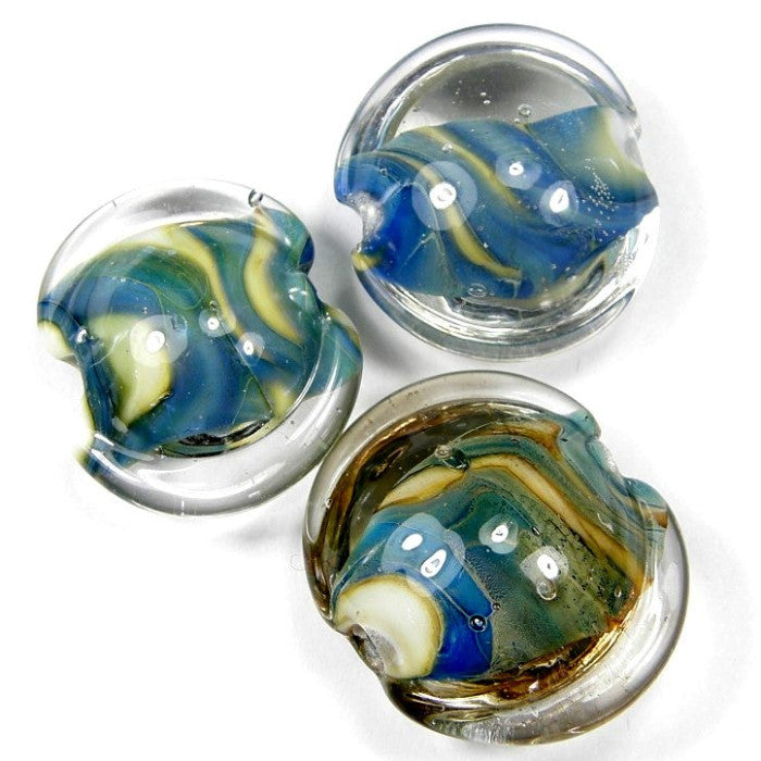 https://covergirlbeads.com/collections/lampwork-bead-sets/products/handmade-lampwork-glass-lentil-bead-set-blue-ivory-kronos-shiny