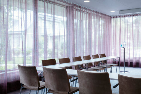 Conference rooms with the red colour scheme, which gives the rooms a fine shimmer.