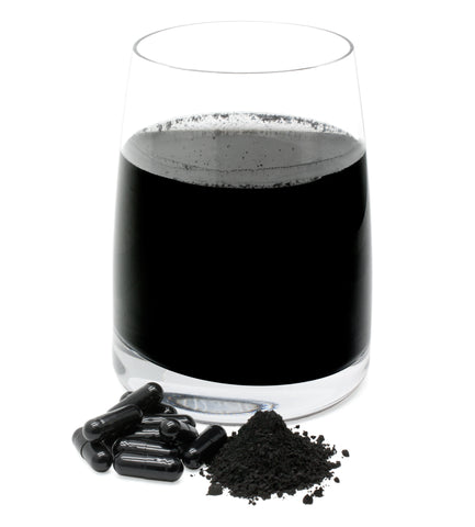 activated charcoal in a glass