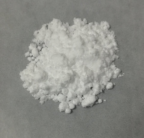 white powder on grey background