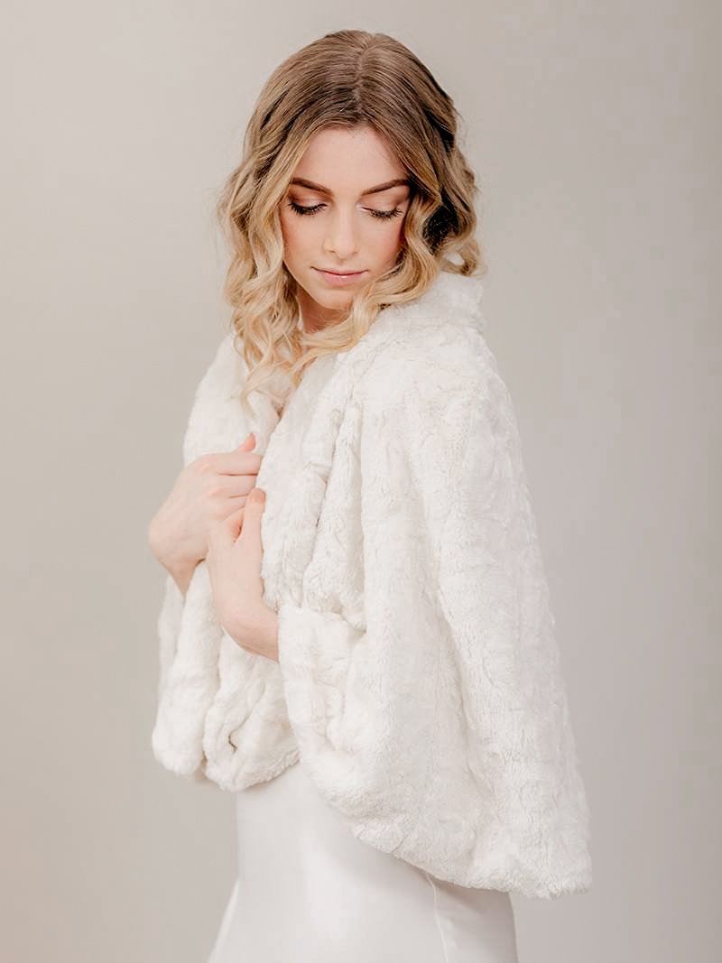 white faux fur cape wedding