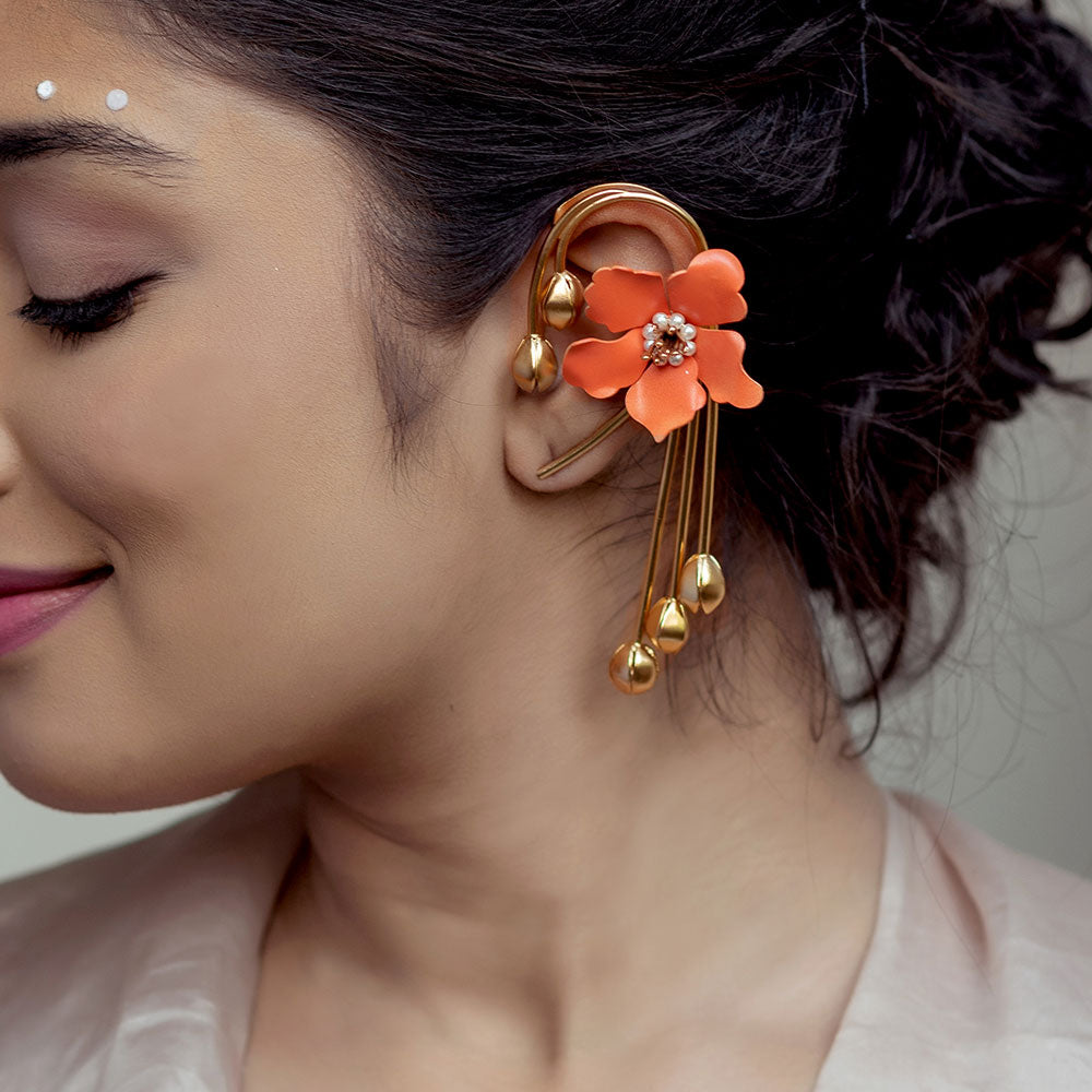 GOLD TONED VIVID ORANGE LILY EAR CUFFS WITH MOGRA BUD FLUTES