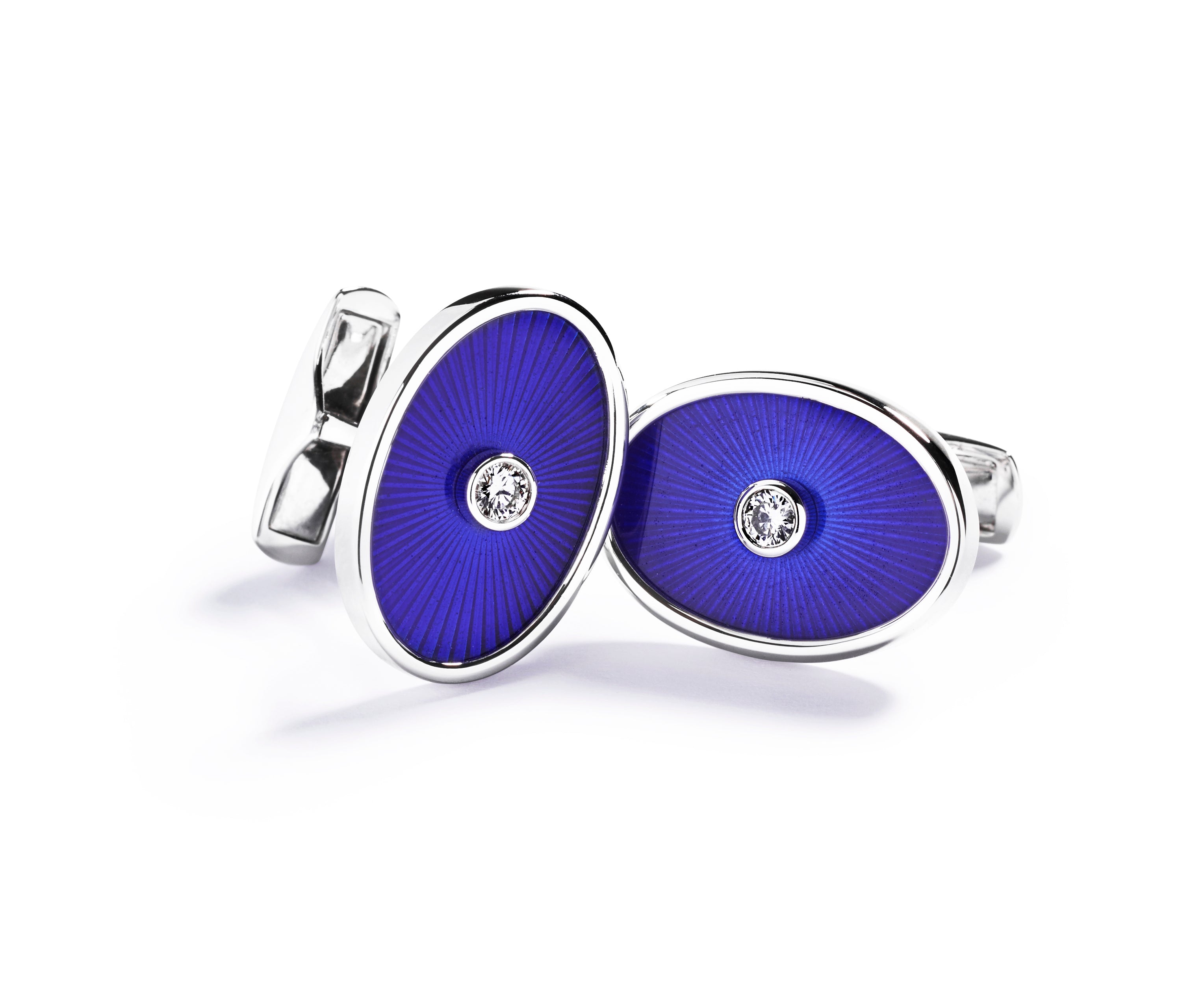 Cufflinks in 18k white gold and blue enamel adorned with two brilliant cut diamonds