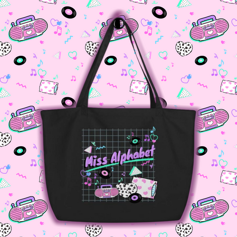 black tote bag with 90's barbie boombox miss alphabet logo
