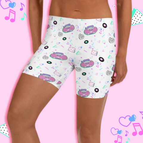 white biking shorts with pink barbie boombox print