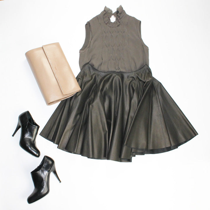 Prada Skirt and Booties Derek Lam top Rochas Clutch