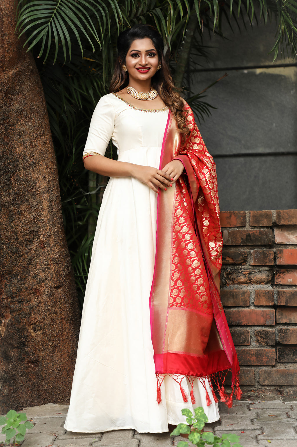 white anarkali with red dupatta