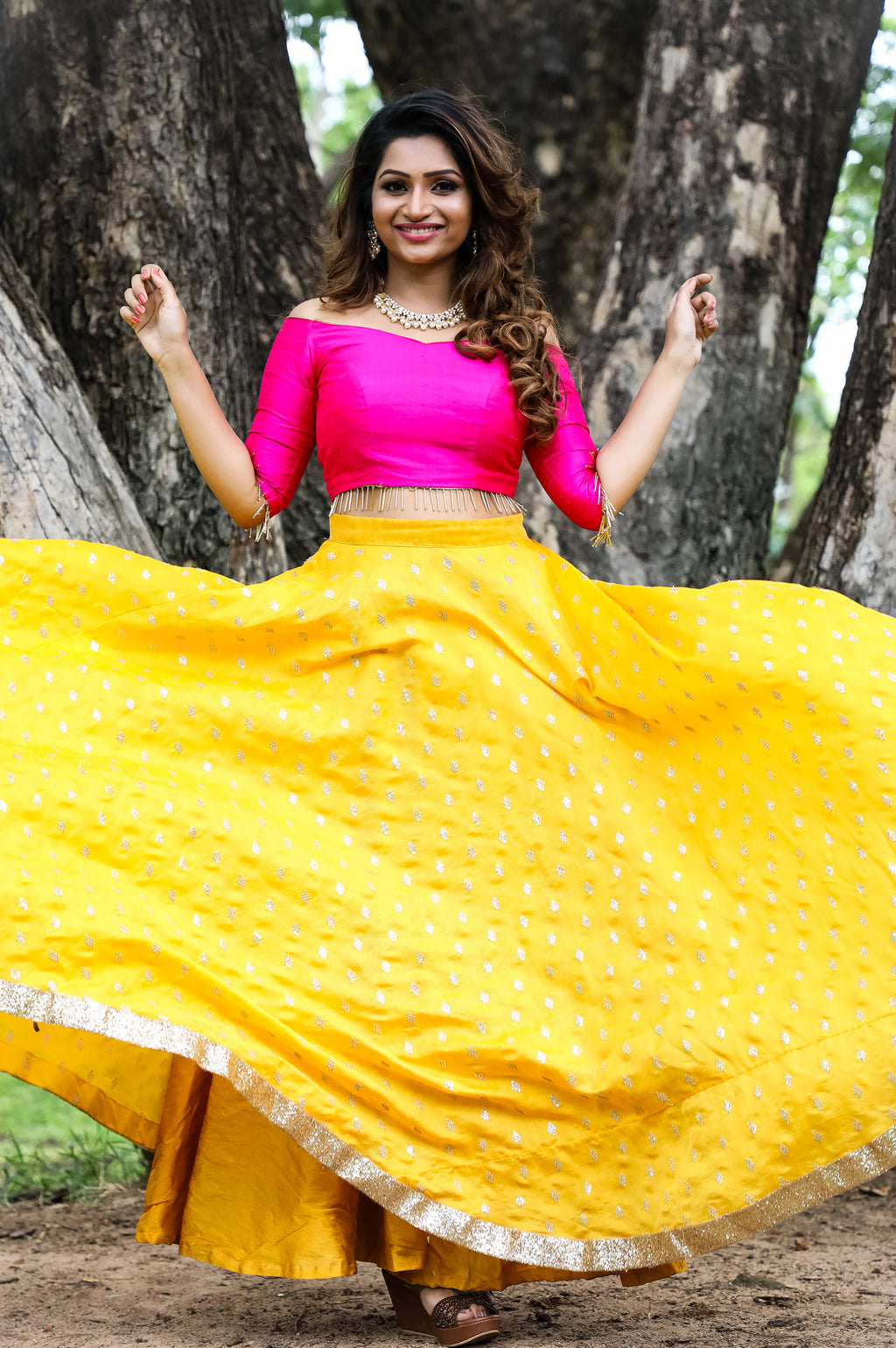 yellow top and pink skirt