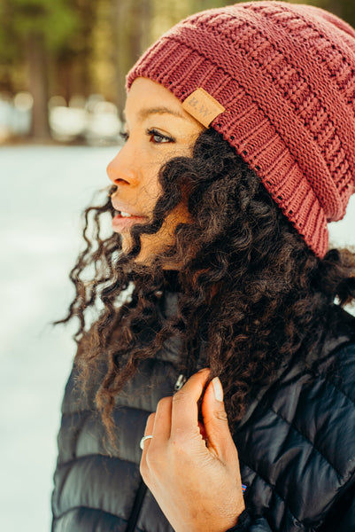 Satin lined hat protecting hair in snow