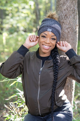 Woman outdoors in charcoal satin lined beanie