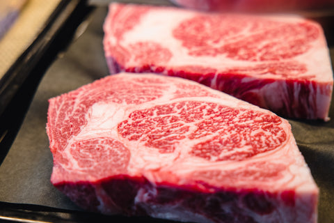 grass-fed meat - steak on a grill - wayt nutrition