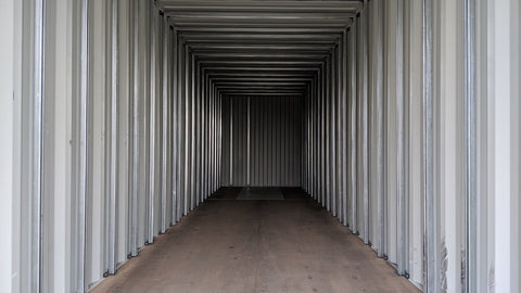 Interior of shipping container that has struts installed.