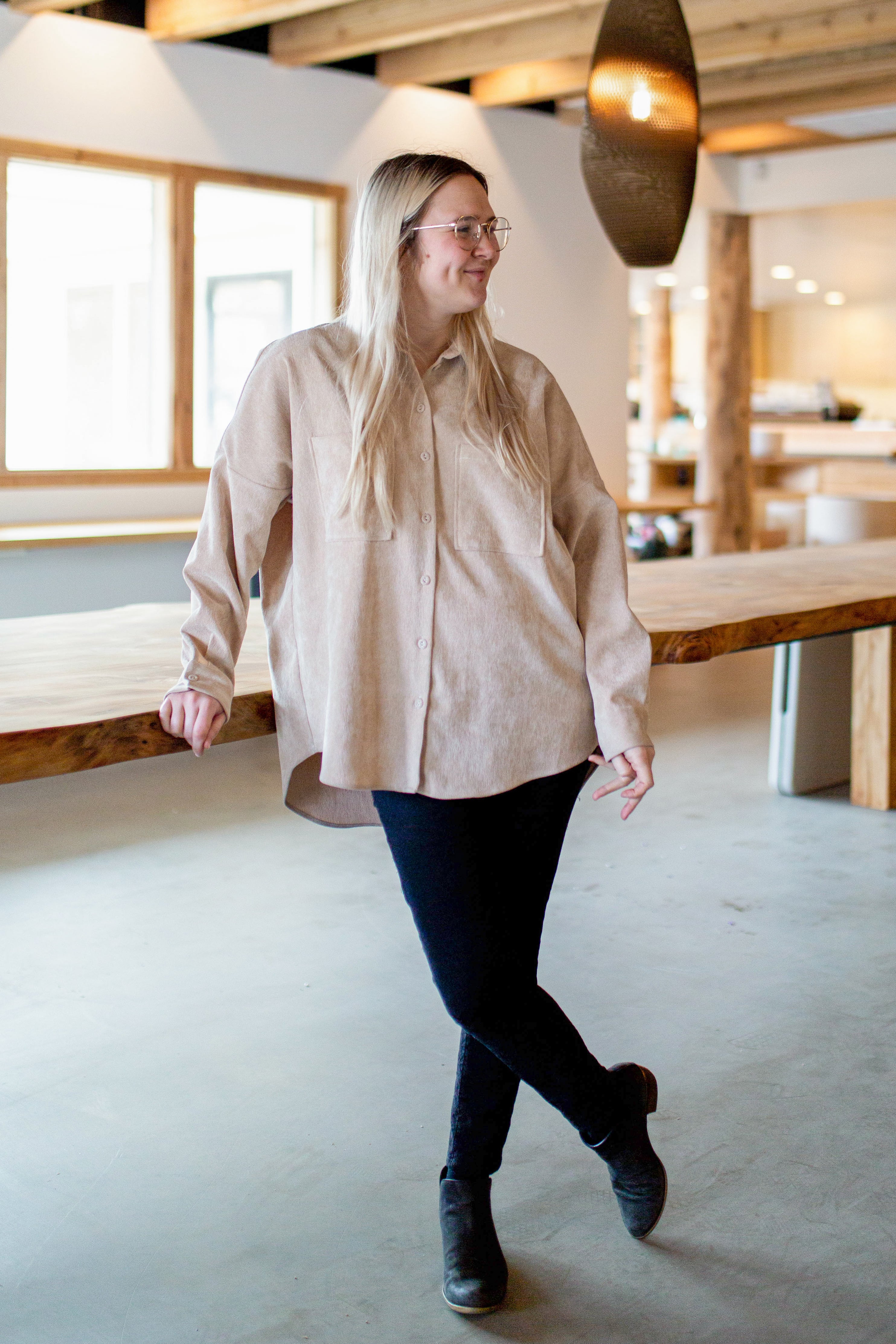 Woman standing in coffee shop