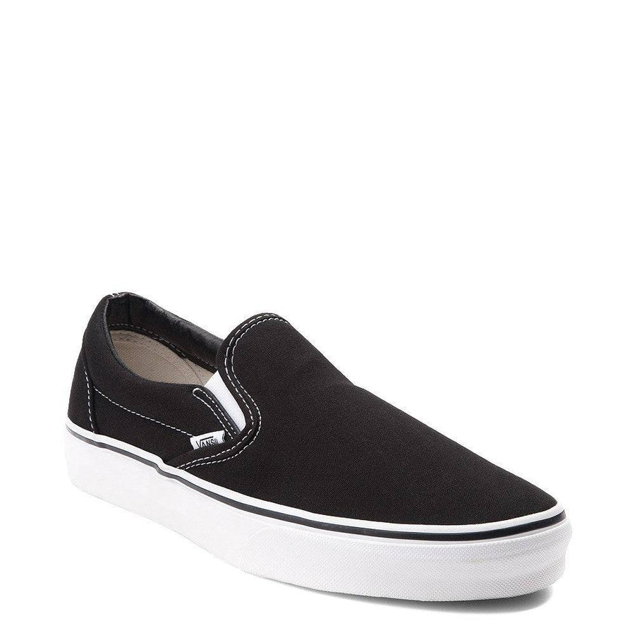 black and white vans slip in