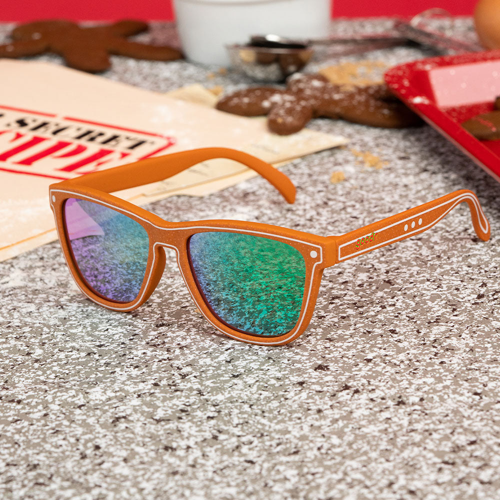 Brown sunglasses with white outline print and green lenses | You'll Never Get This Recipe | goodr sunglasses