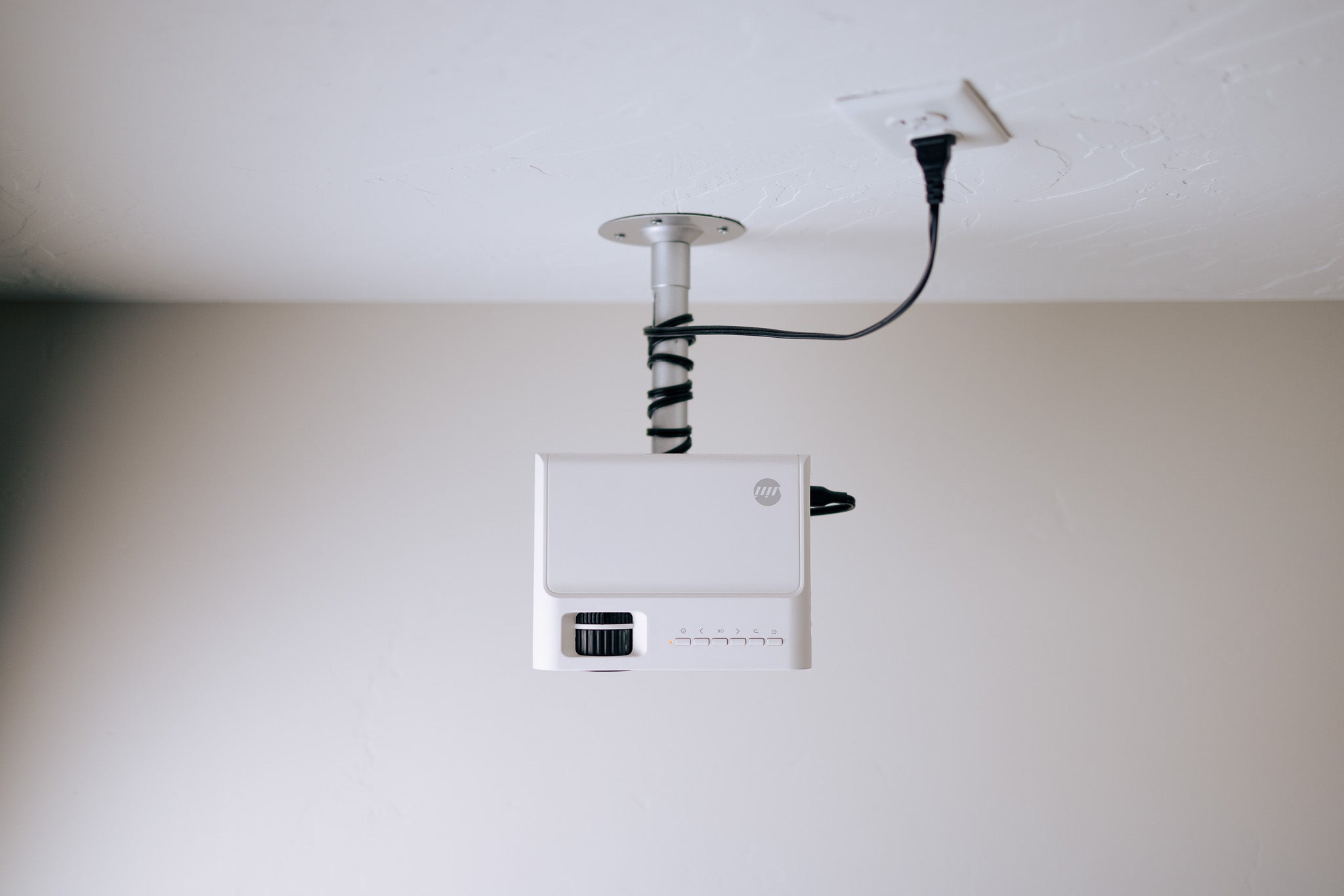 sewing projector hanging from ceiling