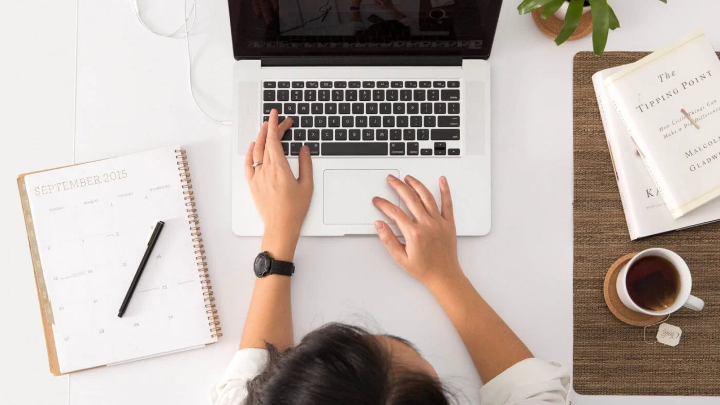 lady typing on laptop