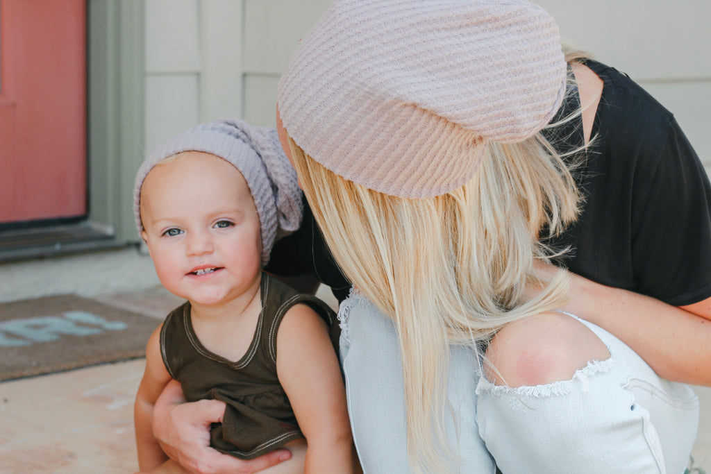 mom and daughter wearing lowland kids slouch beanie