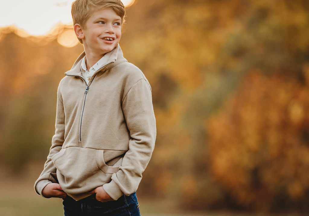 Youth wearing Half Zip Sweater