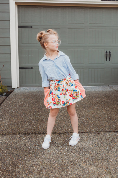 girl standing and wearing lowland kids pocket skirt