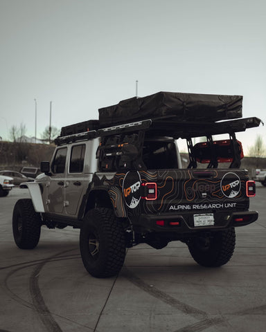 Jeep gladiator outfitted with upTOP overland roof rack and bed rack