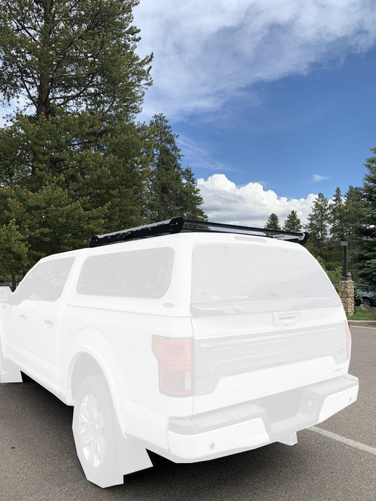 https://cdn.shopify.com/s/files/1/0084/3680/9788/files/upTOP-Overland-Alpha-eX-Ford-F-150-Cap-Rack-Overland-Cap-Rack-upTOP-Overland_409b916d-adc9-4ccb-afc7-9b1324b482a7_535x.jpg?v=1703215248